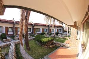 Zahrada ubytování Le Mandrelle Beach Resort