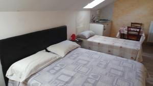 Un ou plusieurs lits dans un hébergement de l'établissement il monolocale