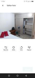 2 fotos de un dormitorio con cama y escritorio en APARTAMENTO MEDELLIN, en Medellín