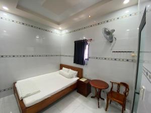 Postel nebo postele na pokoji v ubytování Motel Phạm Lũy