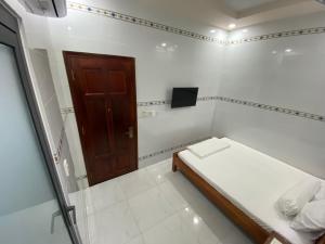 Postel nebo postele na pokoji v ubytování Motel Phạm Lũy