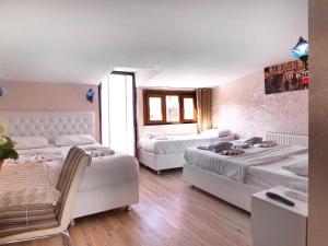 A bed or beds in a room at DİYAR BUDGET HOTEL