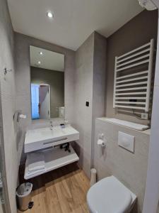 Ванна кімната в Hôtel La Villa Tosca