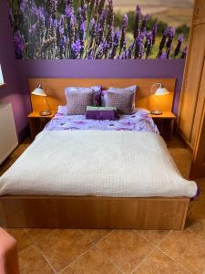 A bed or beds in a room at Villa Kokosowa