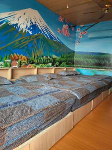 Postel nebo postele na pokoji v ubytování Donggang Town B&B