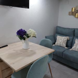 Khu vực ghế ngồi tại La Grulla Apartamento Rural