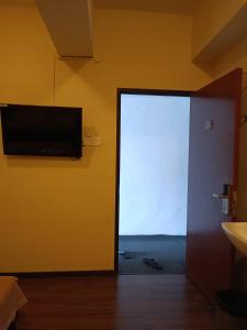 TV a/nebo společenská místnost v ubytování SO Hotel
