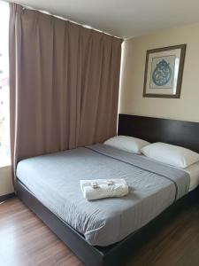 Postel nebo postele na pokoji v ubytování SO Hotel