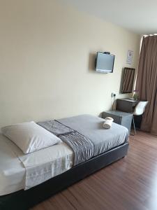 Postel nebo postele na pokoji v ubytování SO Hotel