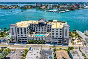 an aerial view of a large building next to the water at East Shore Paradise #448 in Clearwater Beach