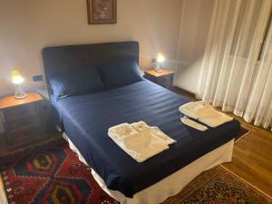 Postel nebo postele na pokoji v ubytování Casa MaLù