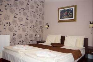 Postel nebo postele na pokoji v ubytování Guest House Prenoćište Piccolina