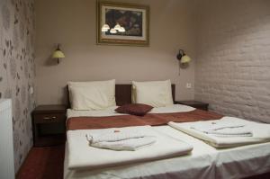 Postel nebo postele na pokoji v ubytování Guest House Prenoćište Piccolina
