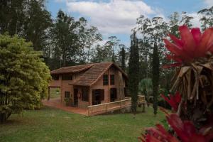 Um jardim em Embaúba Boutique Hotel