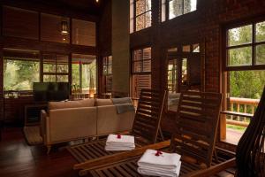 Uma área de estar em Embaúba Boutique Hotel