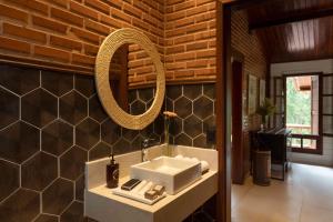 Um banheiro em Embaúba Boutique Hotel