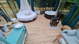 A seating area at REMANSO DE TRASFONTAO_Nido 360°