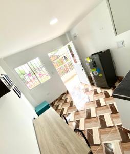 TV a/nebo společenská místnost v ubytování Apartamentos Rincón Garcia