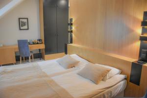 Postel nebo postele na pokoji v ubytování Hotel Nihil Novi + 37 fotografií