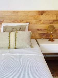 Ένα ή περισσότερα κρεβάτια σε δωμάτιο στο Just Like Home - Casa do Sobreiro Velho em Cerveira