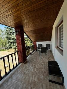 a view of a balcony with a wooden ceiling at Babér Vendégház in Nyíregyháza