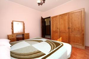 Postel nebo postele na pokoji v ubytování Apartment Pag 529b