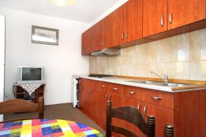 Kuchyň nebo kuchyňský kout v ubytování Apartment Pag 529b