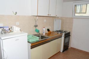 Kuchyň nebo kuchyňský kout v ubytování Apartments by the sea Podgora, Makarska - 518