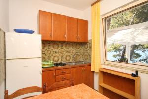 Kuchyň nebo kuchyňský kout v ubytování Apartment Lavdara 433b + 18 fotografií
