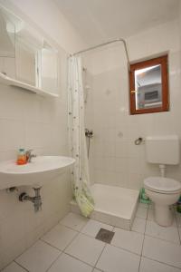 Koupelna v ubytování Apartments by the sea Sali, Dugi otok - 454 + 36 fotografií