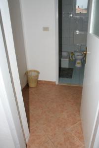 Kúpeľňa v ubytovaní Apartment Podgora 518d