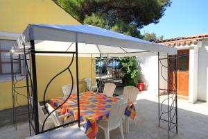 Patio nebo venkovní prostory v ubytování Seaside secluded apartments Lavdara, Dugi otok - 434 + 21 fotografií