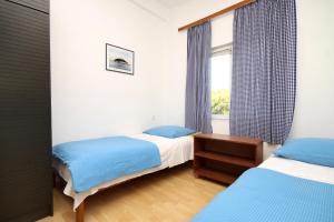 Postel nebo postele na pokoji v ubytování Seaside secluded apartments Lavdara, Dugi otok - 434