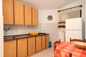 Kuchyň nebo kuchyňský kout v ubytování Seaside secluded apartments Lavdara, Dugi otok - 434