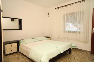 Postel nebo postele na pokoji v ubytování Seaside secluded apartments Lavdara, Dugi otok - 434