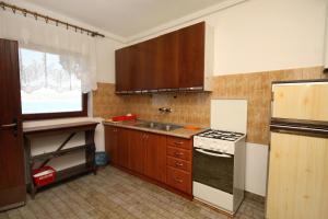 Kuchyň nebo kuchyňský kout v ubytování Seaside secluded apartments Lavdara, Dugi otok - 434