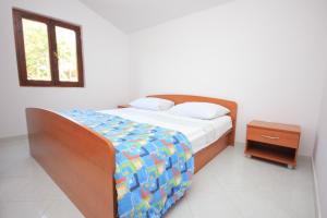 Postel nebo postele na pokoji v ubytování Seaside secluded apartments Cove Dumboka bay - Dumboka (Dugi otok) - 489