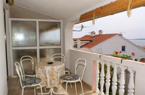 Balkón nebo terasa v ubytování Apartments by the sea Mandre, Pag - 523
