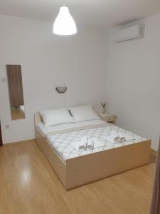 Postel nebo postele na pokoji v ubytování Apartments by the sea Podaca, Makarska - 515