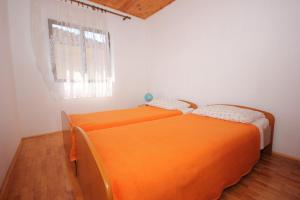 Posteľ alebo postele v izbe v ubytovaní Apartments with parking spaces Sali, Dugi otok - 447