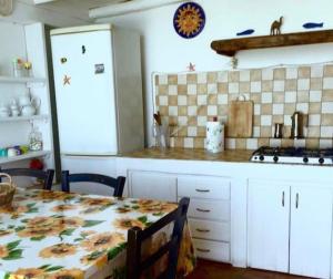 Casa Vacanze sul mare tesisinde mutfak veya mini mutfak