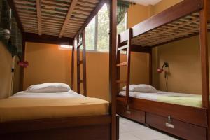 Letto o letti in una camera di Dreamkapture Hostel close to the airport and bus terminal