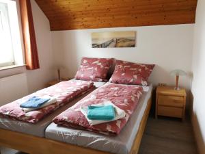 Tempat tidur dalam kamar di Taubennest