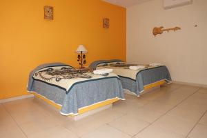 Postel nebo postele na pokoji v ubytování Quinta Comala Hotel & Villas