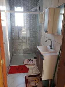 Koupelna v ubytování Residencial Soulmar Balneário Gaivota - SC -S01- Village Dunas Norte - 1,5 quadra do mar
