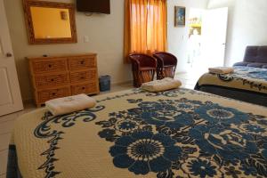 Postel nebo postele na pokoji v ubytování Quinta Comala Hotel & Villas + 37 fotografií