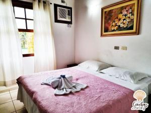 Postel nebo postele na pokoji v ubytování Pousada Conchas de Paraty