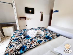 Postel nebo postele na pokoji v ubytování Pousada Conchas de Paraty