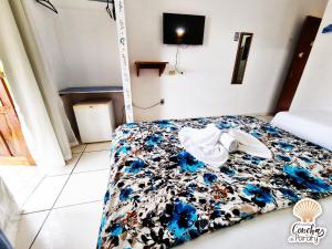 Postel nebo postele na pokoji v ubytování Pousada Conchas de Paraty