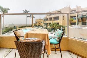 Μπαλκόνι ή βεράντα στο Ocean Pointe Lagoon 107 Dog's ok, ocean-view condo w/WiFi, patio, 2 pools, spa, shared grill area